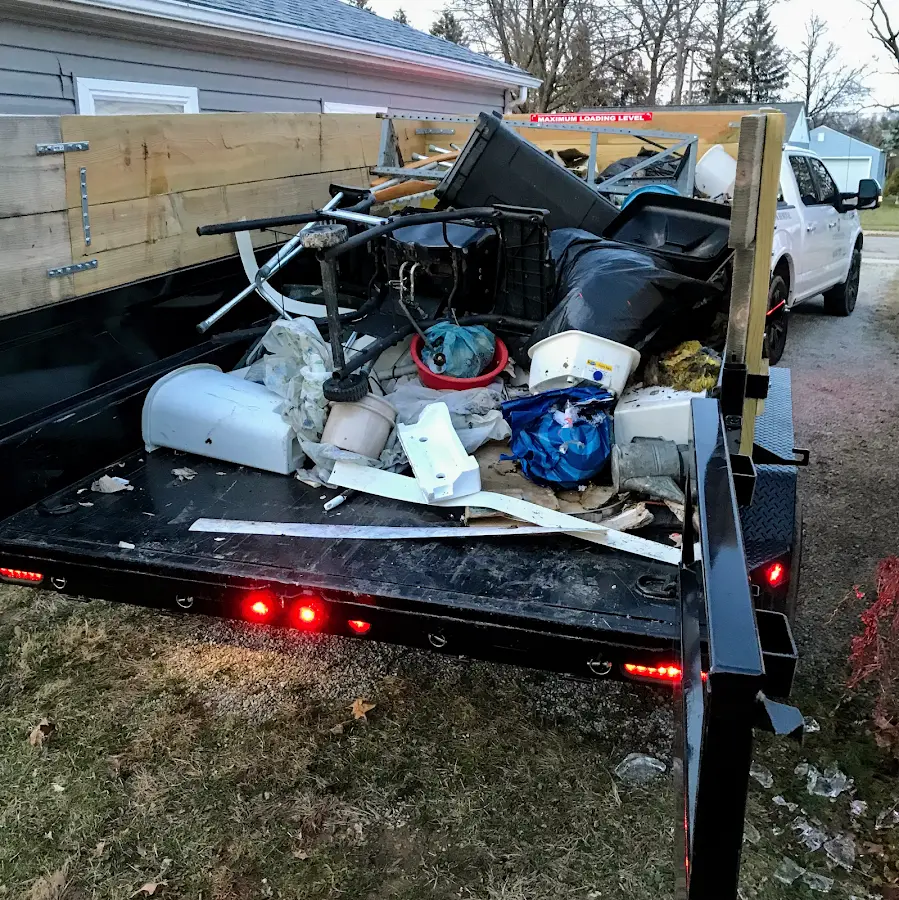 Roll-off dumpster delivered to a residential driveway in Medina